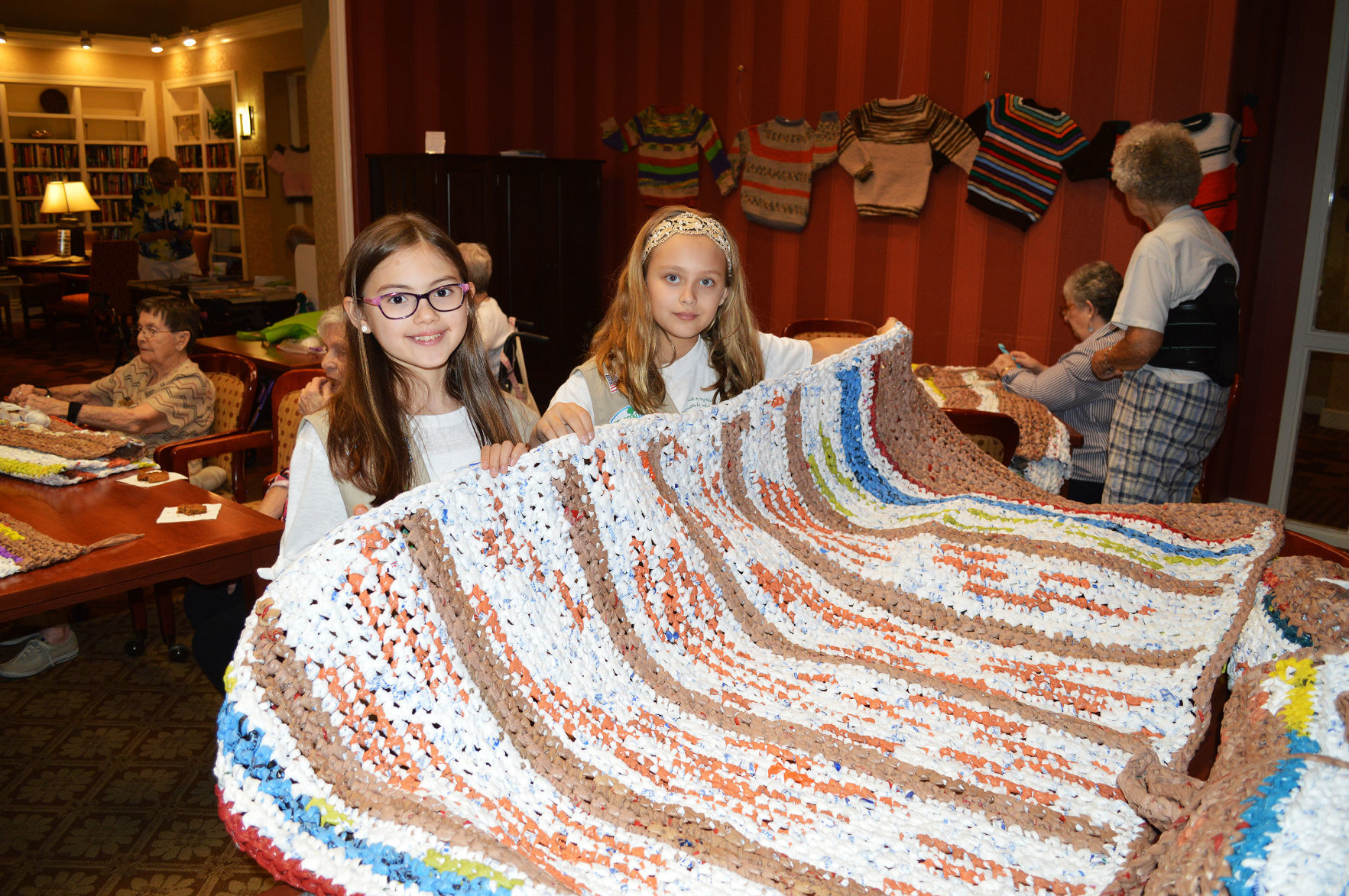 Homeless benefit from seniors' project to upcycle grocery bags